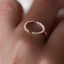 Placeholder: delicate thin ring with tiny diamond, rose gold, thin ring