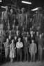 Placeholder: 1900's black and white vintage photo, interior, working (alien) organ manufacturing factory warehouse, unhappy and angry,stange long grey alien human hybrid creature with a family that is super sad, captured on square format film, grainy brown, aged, old men depressed, tired