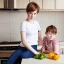 Placeholder: Realistic photo Russian shorthair beautiful tomboy boyish boylike young mother-in-future wide hips in kitchen