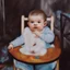 Placeholder: a baby in a fantasy card illustration