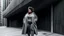 Placeholder: Woman with a bold, curvy design nestled in a drab, grey urban environment