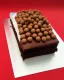 Placeholder: Rishi sunak model made of chocolate cake with Maltesers