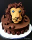 Placeholder: Lion aslan model made of Chocolate cake with chocolate buttons