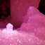 Placeholder: single pink crystal, on an altar in a foggy cave