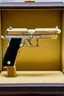 Placeholder: A luxurious (((gun))) crafted from solid gold, intricate details like diamonds around and (silver) engravings, exuding opulence and power, with a pearl pistol grip, displayed in a gold display case with black felt