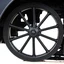 Placeholder: isolated image of a spoked steel wheel(black) from a steam train. vignette of just the wheel