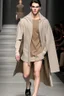 Placeholder: a guy winter fashion runway with modern clothes inspired by Superman Kryptonian style clothes, embroidery elegant fashion beige tones