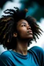 Placeholder: beautiful black woman who is tired of being strong and looking up to sky for help, her hair is a short wavy blu afro.