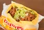 Placeholder: "Taco in a Bag" which consists of an open Doritos chip bag containing Doritos chips and cooked ground beef and lettuce and shredded cheese and tomato pepper and onions, food blogger photography