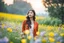 Placeholder: Young woman in flower field in the evening