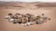 Placeholder: desert with things people have lost piled on the ground