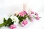 Placeholder: flowers and candles on white background stock photo