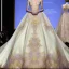 Placeholder: stunning couture gown designed by Marchesa inspired by fairytales, realistic, detailed, high quality, intricate, dreamlike background, soft pastel colors