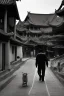 Placeholder: Black & white man walks on road's chinese village with playing light and shadow as ho fan style