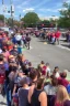 Placeholder: stadium sized crowd waiting in line for awesome looking food truck that has a bunch of bright paint and flashy lighs