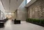 Placeholder: Modern stone wall, museum reception