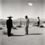 Placeholder: Archival photograph of aliens landing at Area 51 and meeting Orson Welles in jaunty desert garb