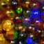 Placeholder: various glass marbles shiny golden galactic ambience galaxies shiny high detail high def 8k high reflections