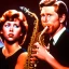 Placeholder: eyes closed REd-haired ron howard as richie from happy days Is playing the Alto saxophone with his "eyes closed", rock band, looking at camera