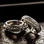 Placeholder: A beautifully crafted pair of wedding rings, shining with elegance and intricate details