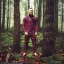 Placeholder: conor mcgregor with a red plaid shirt, a backpack and a rifle in a creepy forrest with zombies