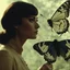 Placeholder: [The Duke of Burgundy] A woman who studies butterflies and moths tests the limits of her relationship with her lesbian lover. [vintage style noisy scratches glitches, Shot the texture and then rewound the film and double exposed from a 1970 B series movie]