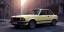 Placeholder: an abandoned 1990 bmw 2-door 4k ,ultra realistic,concept, 4k ,on street, parked in crowded city winter,8k resolution, high-quality, fine-detail