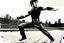 Placeholder: bruce lee,,in,his,prime,doing,flying,kick