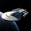 Placeholder: The starship Mercury from Star Trek, a elongated version of the 1701-D with 6 nacelles and a hammer head shark shaped saucer and engineering section