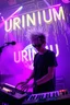 Placeholder: French cool synth player with crazy techno acid hair, he is called "Jean-Maurice Brûlée" performing at dance club, his name is "Jean-Maurice Brûlée" , white and purple Neon lights and purple smog, yellow shower rain, and "URINIUM" big sign on the wall, he is playing on synthesizers on stage with lot of laser beams and wearing black sunglasses, an earth is projected in background