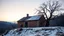 Placeholder: a lonely old adobe hut with a small window, a crumbling roof, an old chimney stands on a hill, next to it is a small woodshed by the wall, and an old withered tree leans over the hut, the hut stands on the edge of a European forest, winter, snowy landscape, low light, dawn, high detailed, sharp focus, high realistic, perfect photo