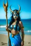 Placeholder: A picture of a beautiful blue faced indian goddess with skin painted blue, blue painted body, blue painted torso, wild black hair, stag antlers, elven ears, golden skirt, holding a staff on a sunny beach