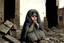 Placeholder: Grey sky, crying little palestinian girl wearing kuffeah , rocks, destroyed buildings , emotional influence, friedrich eckenfelder and willem maris impressionism paintings