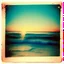Placeholder: Photographic, Sea, soft turquoise waves, polaroid with damaged border, 1968, sunset, scotch tape on the border, scribblings