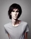 Placeholder: a tall rattled guy with short dark hair tousled on top, a long neck and limbs and is wearing a t-shirt with a shirt over and skinny jeans