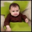 Placeholder: a green and brown baby grot realistic