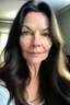 Placeholder: A selfie of a brunette woman with a round face, long hair taken at spa salon. showing incredibly beautiful extremely attractive 57-year-old European woman. (She has white skin, tousled black hair, pretty face without makeup, big round brown eyes, cute profiled nose, detailed full lips.)