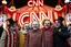 Placeholder: a group of clowns in front of the circus with a CNN logo
