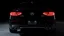 Placeholder: Full image of the rear view of a black Mercedes-Benz CLS with lights on