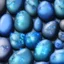 Placeholder: Blue raindrops on a rock, close up view, photo quality, stone marble, ultra realistic, light and shadow and reflections, zoom