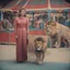 Placeholder: A woman , with a lion, at the circus, 1960s, autochrome, pink, red orange, blue