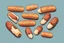 Placeholder: corndogs in a clean vector style