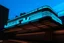 Placeholder: FUTURE illuminated sign on the roof of a building