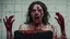 Placeholder: a gross woman covered in blood holding up a black rectangular box