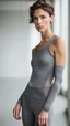 Placeholder: photography of a beautiful anorexic woman, grey satin triathlon top, brunette wavy pixie haircut, pronounced sternum, flat chest, grey satin cycling leggins