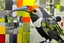 Placeholder: ink and paint of holo sizzle, arafed nonsense contradicting toucans in liminal space, double negative vibe, unnerving vibe, whimisical influence, grotesque vibe, ink and tint leak, minimal, brutalist, Aztec, drab and gray and orange and yellow