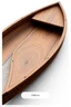 Placeholder: Great wooden boat texture, 1hit.no an example of incredible web site design with swirls and big menu buttons, 3d construction drawings on white paper