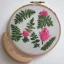 Placeholder: ferns in embroidery hoop, intricate, detailed, delicate