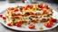 Placeholder: Lasagna with feta cheese, colorful peppers and cherry tomatoes..