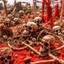 Placeholder: A red rotting wasteland with bones designed in African masks